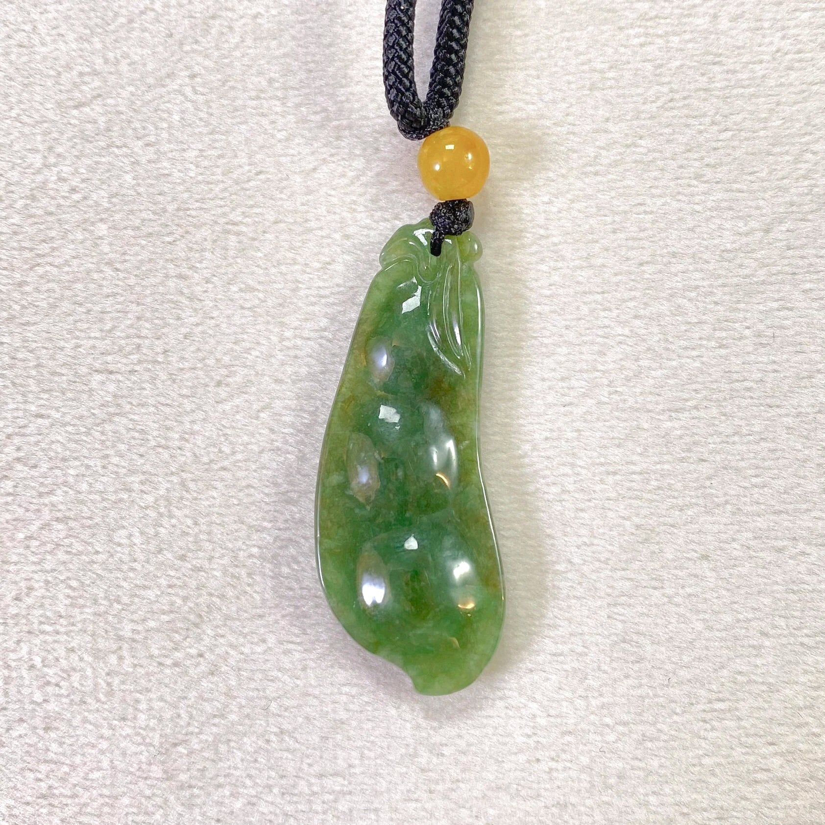 Handcrafted Peapod-Shaped Green Jade Pendant with Orange Bead
