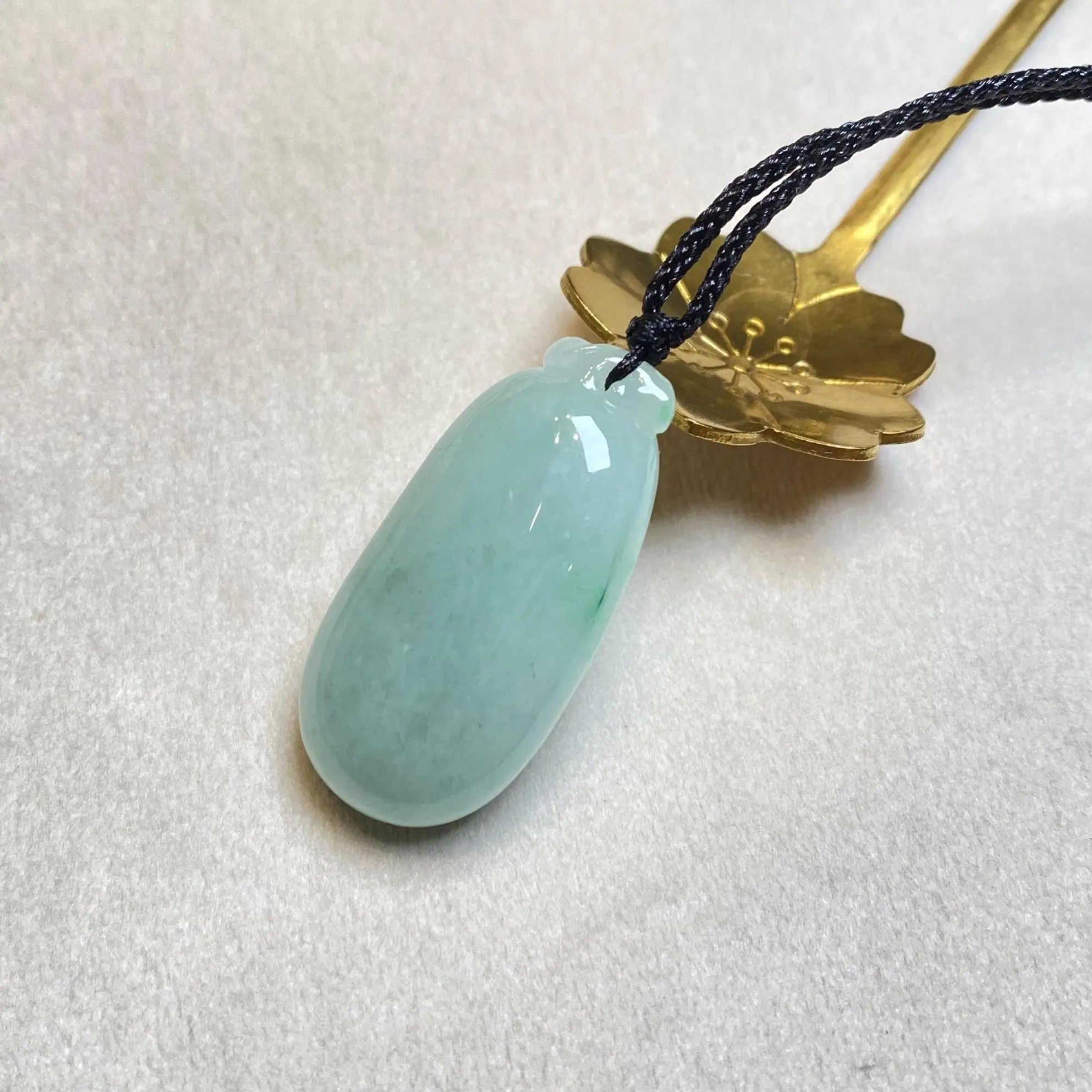 Gransky Handmade Carved Melon Smooth Green Jade Pendant