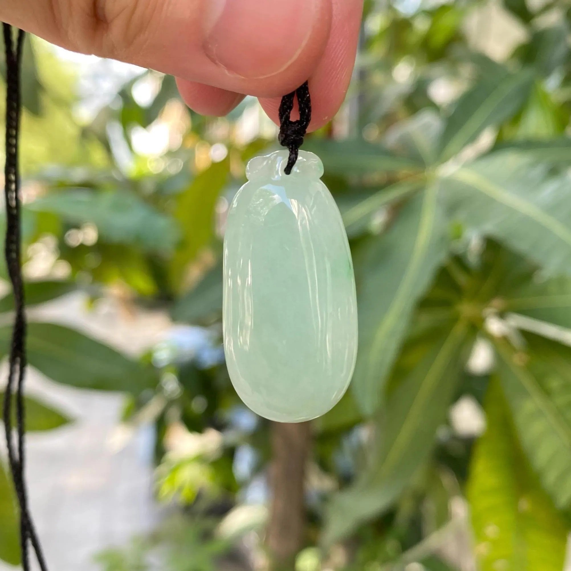 Gransky Handmade Carved Melon Smooth Green Jade Pendant