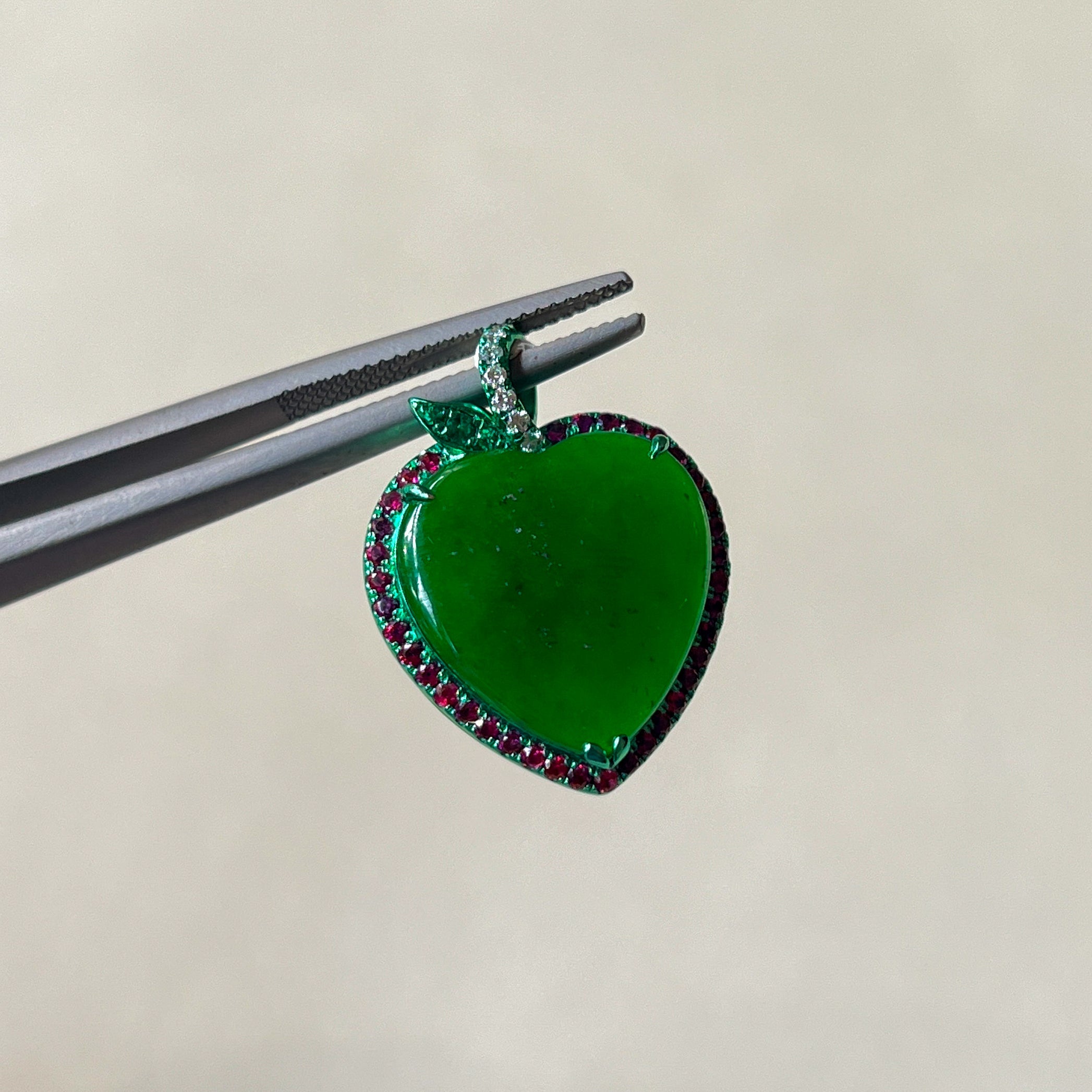 Imperial Green Heart-Shaped Jade Pendant – 18K Green Gold & Ruby Accent