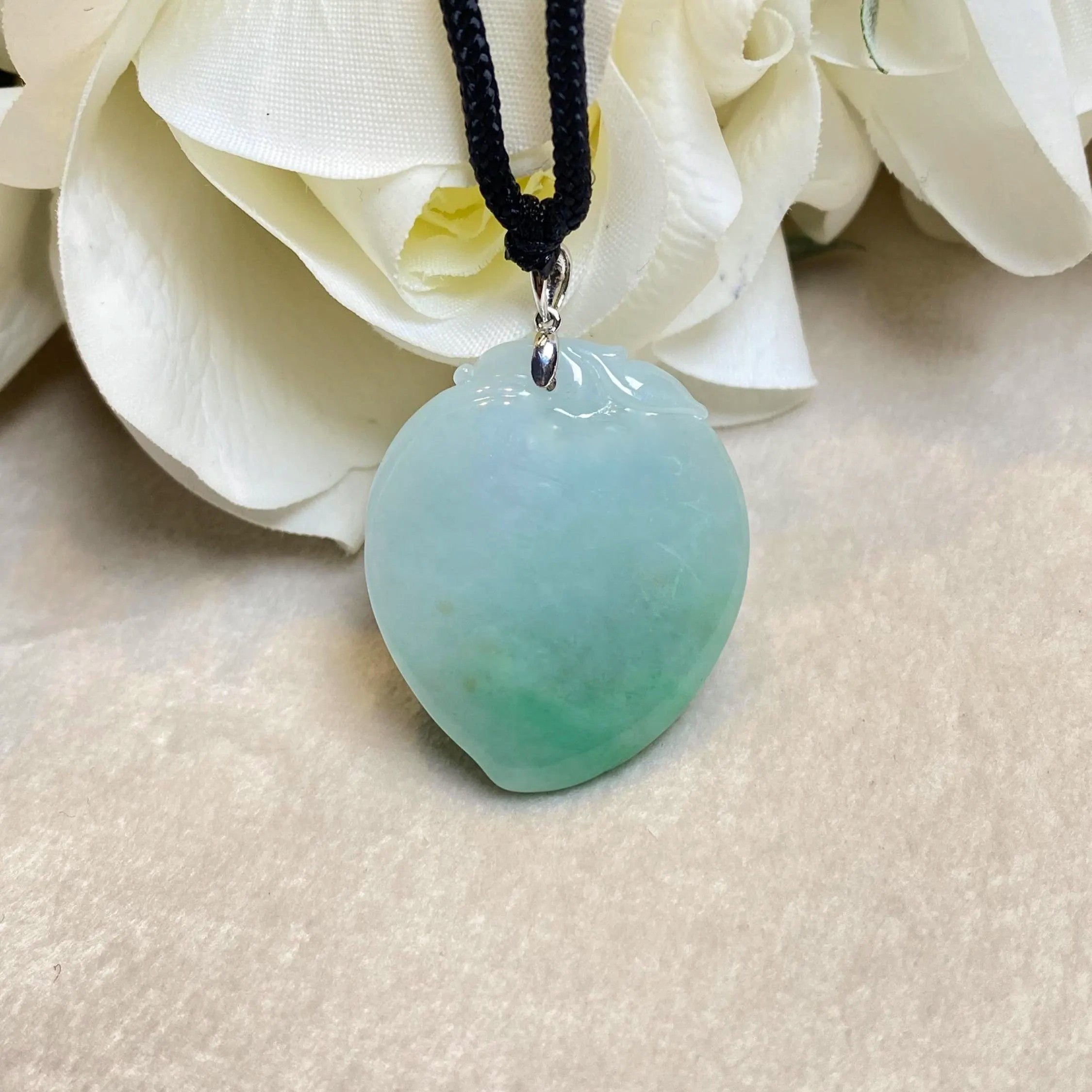 Imperial Green Peach Carved Burmese Jadeite Pendant in 18K White Gold Bail