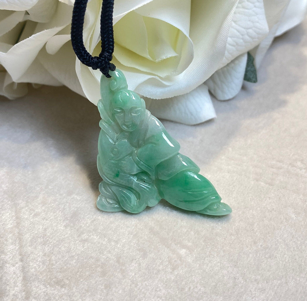 Handcrafted Green Jade Fisherman Catching Fish Pendant - Emblem of Peace and Serenity