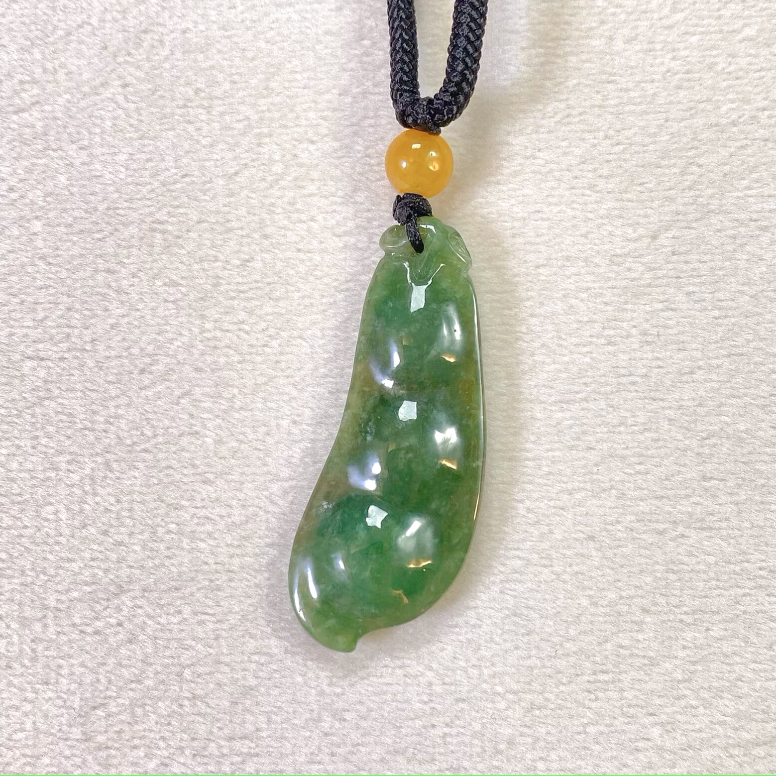 Handcrafted Peapod-Shaped Green Jade Pendant with Orange Bead