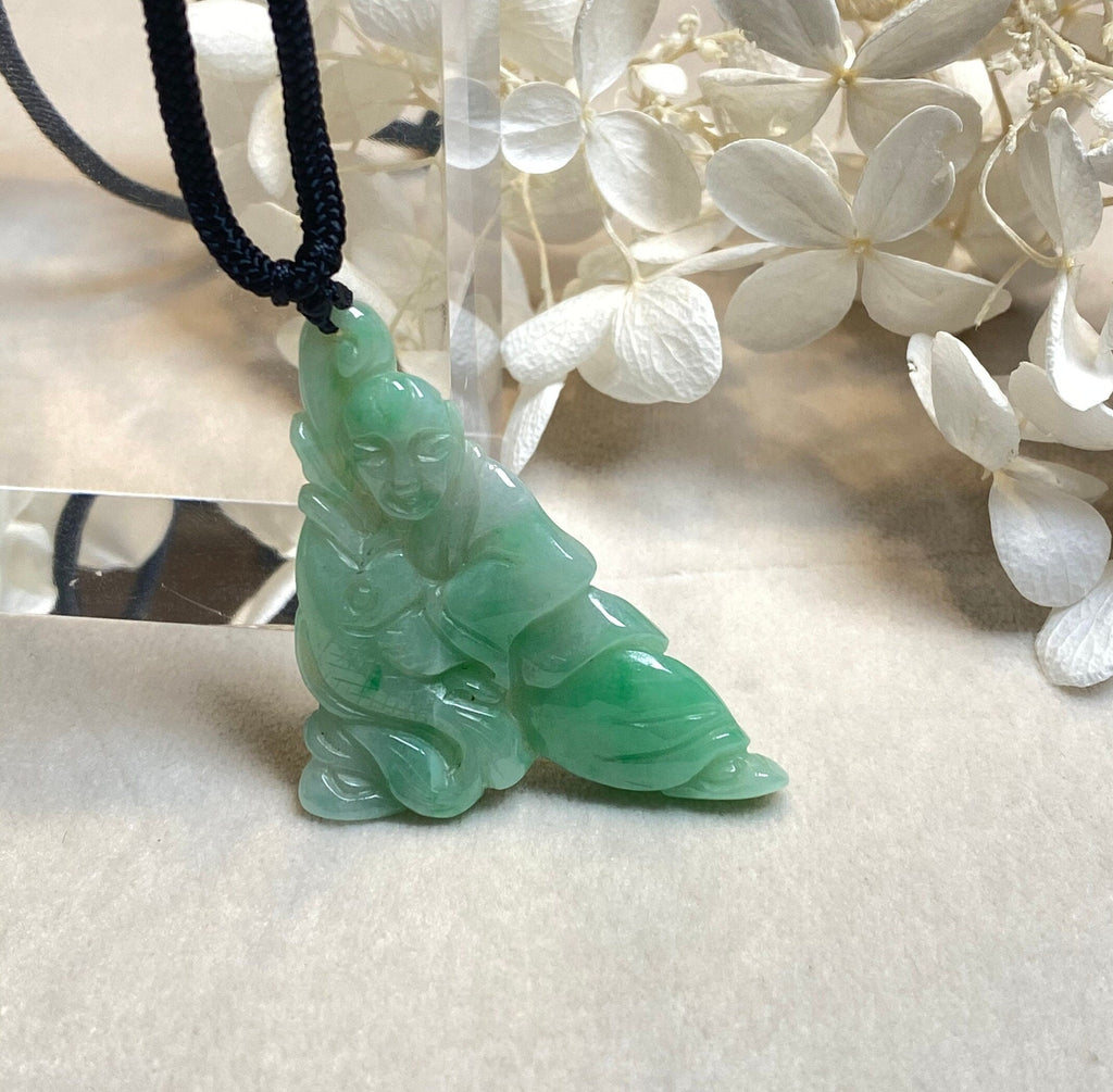 Handcrafted Green Jade Fisherman Catching Fish Pendant - Emblem of Peace and Serenity