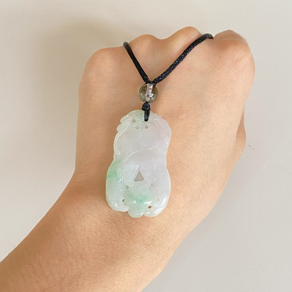 Purple and Green Jade Buddha Hand Pendant with Mudra Symbolism