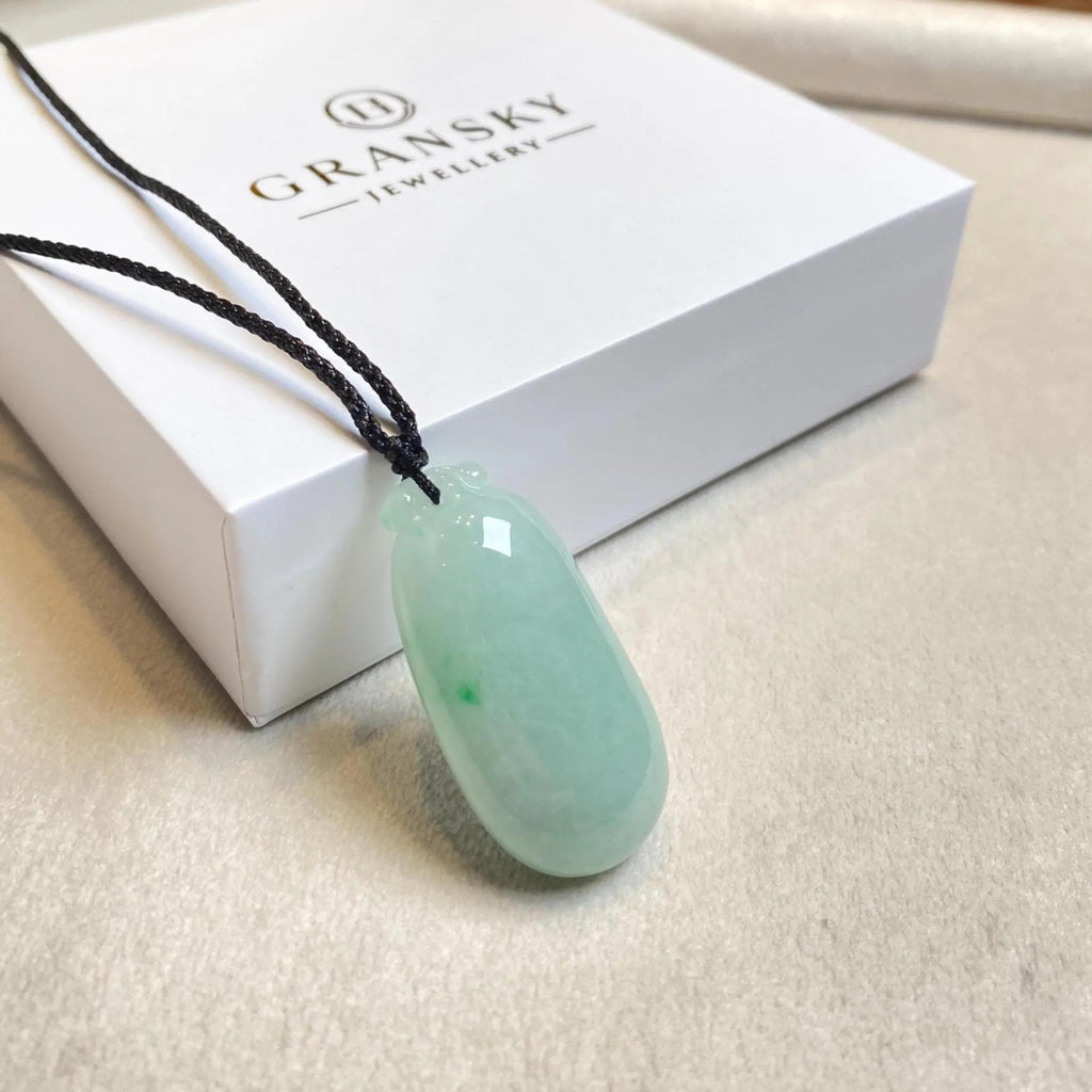 Gransky Handmade Carved Melon Smooth Green Jade Pendant