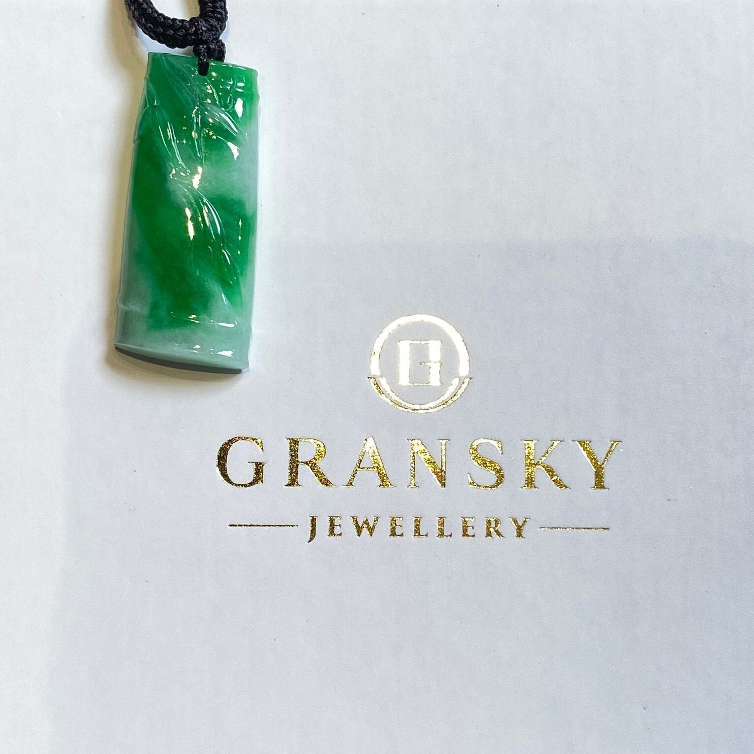 Bright Green Hand-Carved Bamboo Jade Pendant