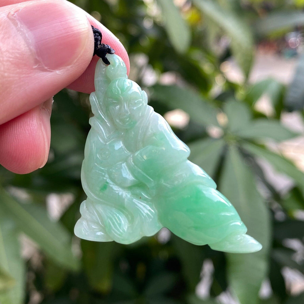 Handcrafted Green Jade Fisherman Catching Fish Pendant - Emblem of Peace and Serenity