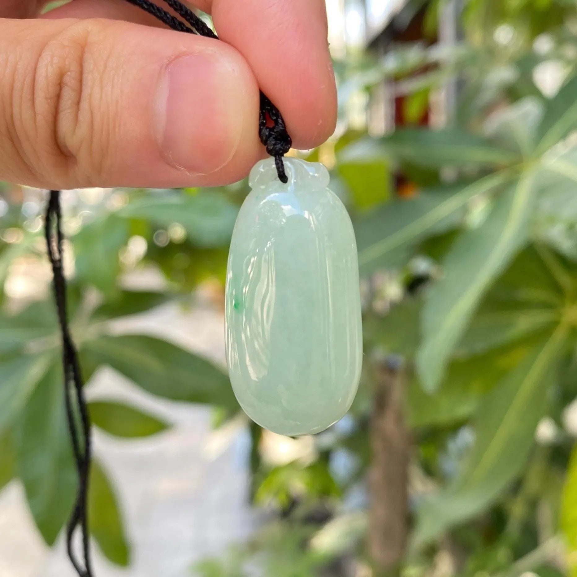 Gransky Handmade Carved Melon Smooth Green Jade Pendant