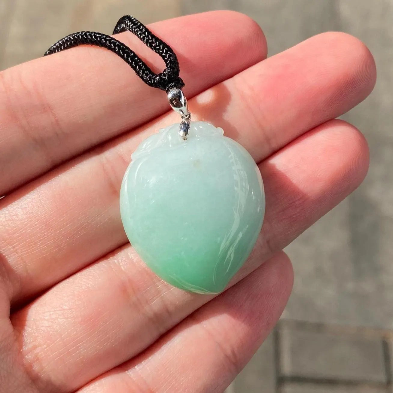 Imperial Green Peach Carved Burmese Jadeite Pendant in 18K White Gold Bail