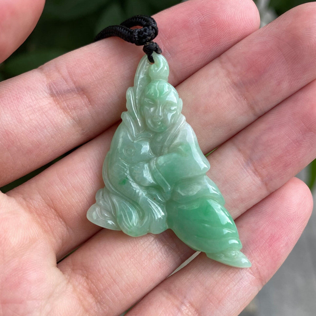 Handcrafted Green Jade Fisherman Catching Fish Pendant - Emblem of Peace and Serenity