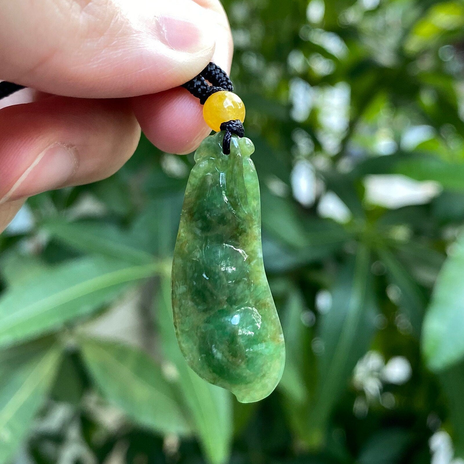 Handcrafted Peapod-Shaped Green Jade Pendant with Orange Bead