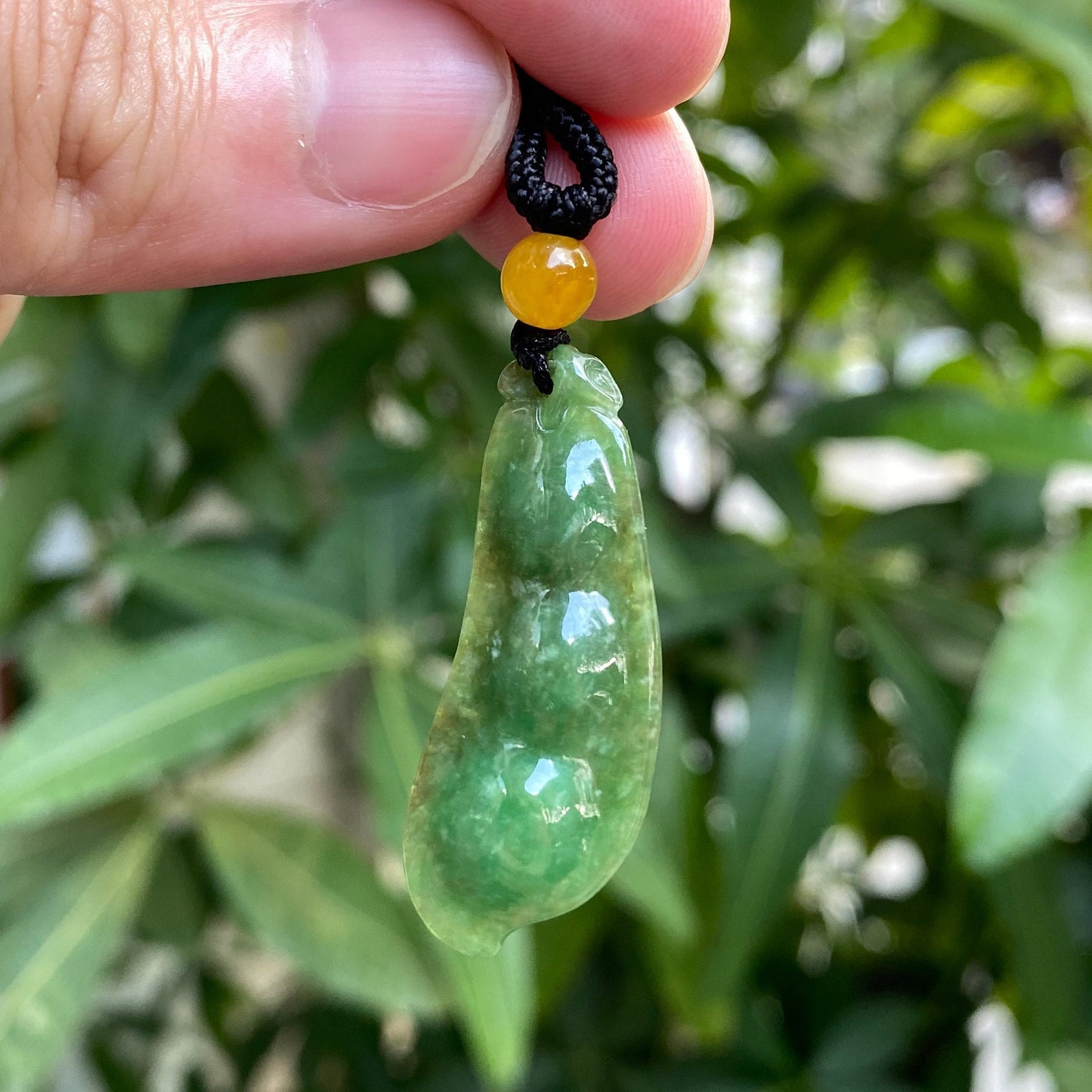 Handcrafted Peapod-Shaped Green Jade Pendant with Orange Bead