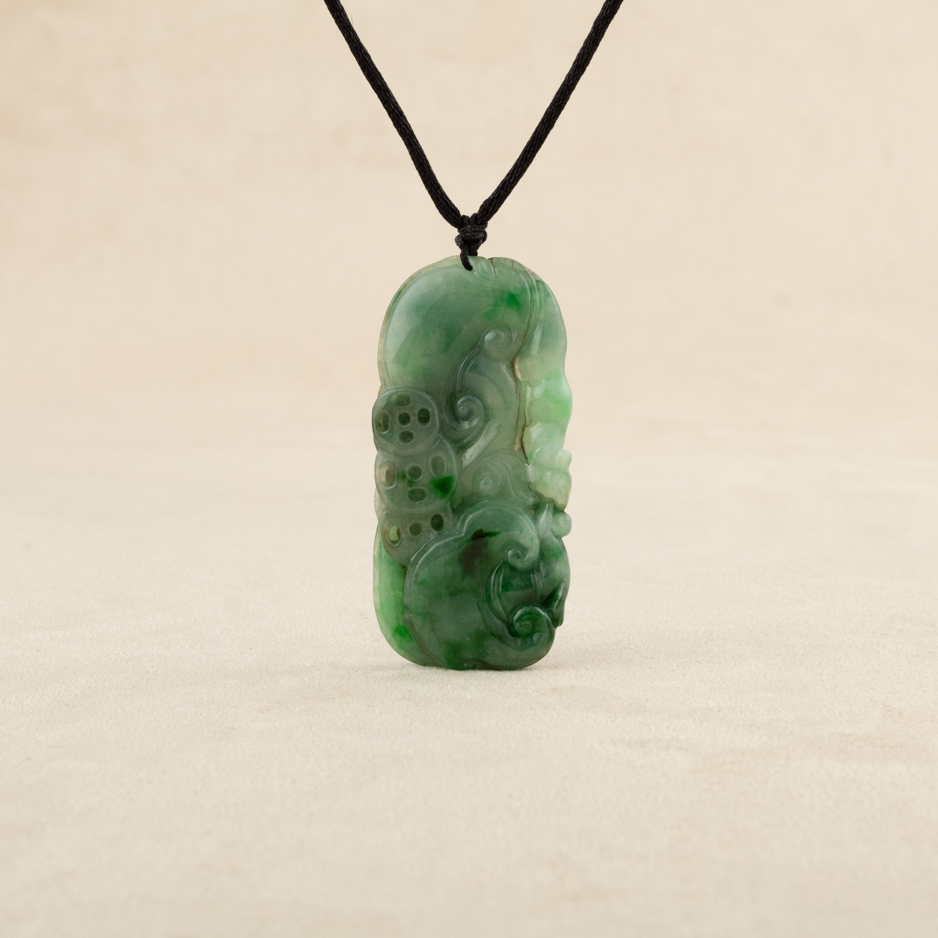 Carved Green Jade Ruyi Token Pendant