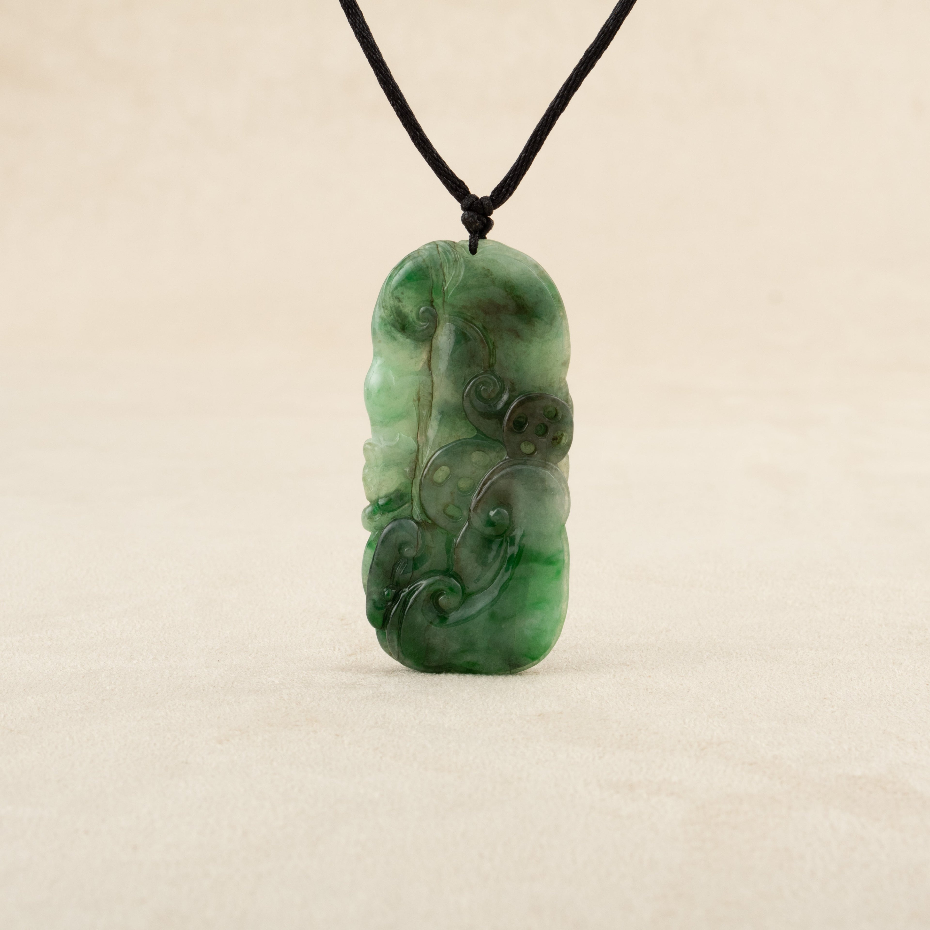Carved Green Jade Ruyi Token Pendant