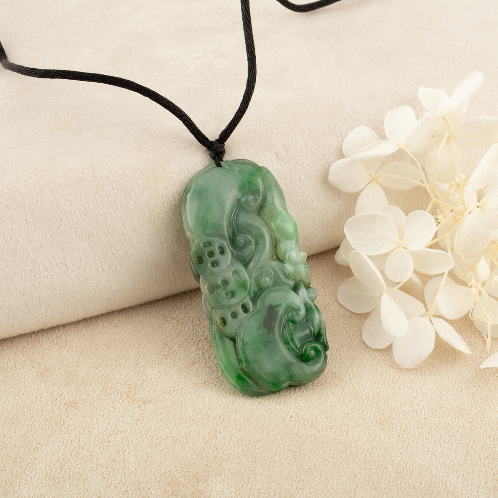 Carved Green Jade Ruyi Token Pendant
