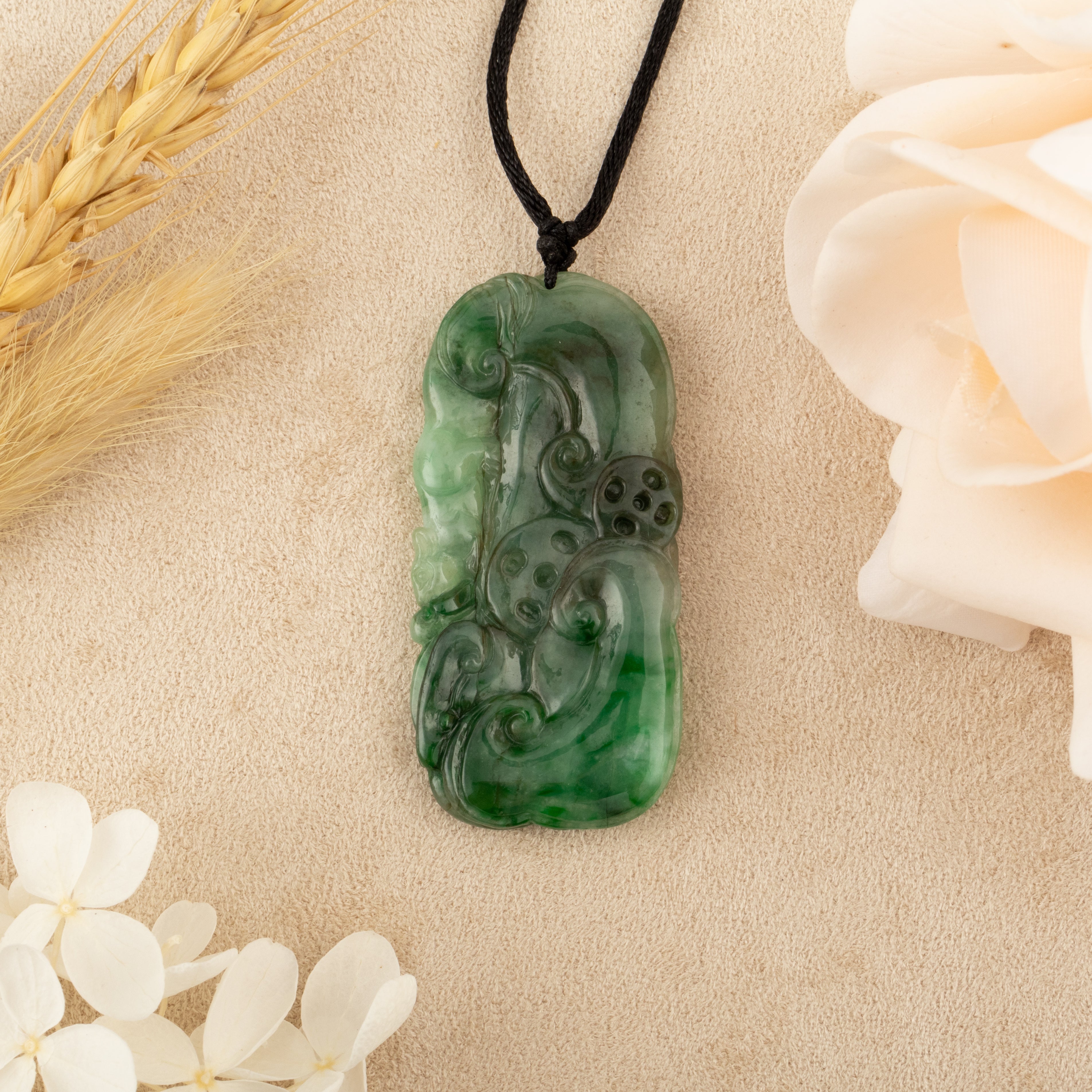 Carved Green Jade Ruyi Token Pendant
