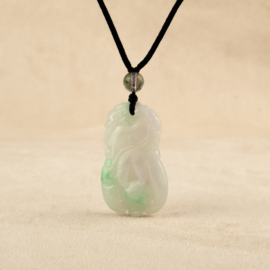 Purple and Green Jade Buddha Hand Pendant with Mudra Symbolism