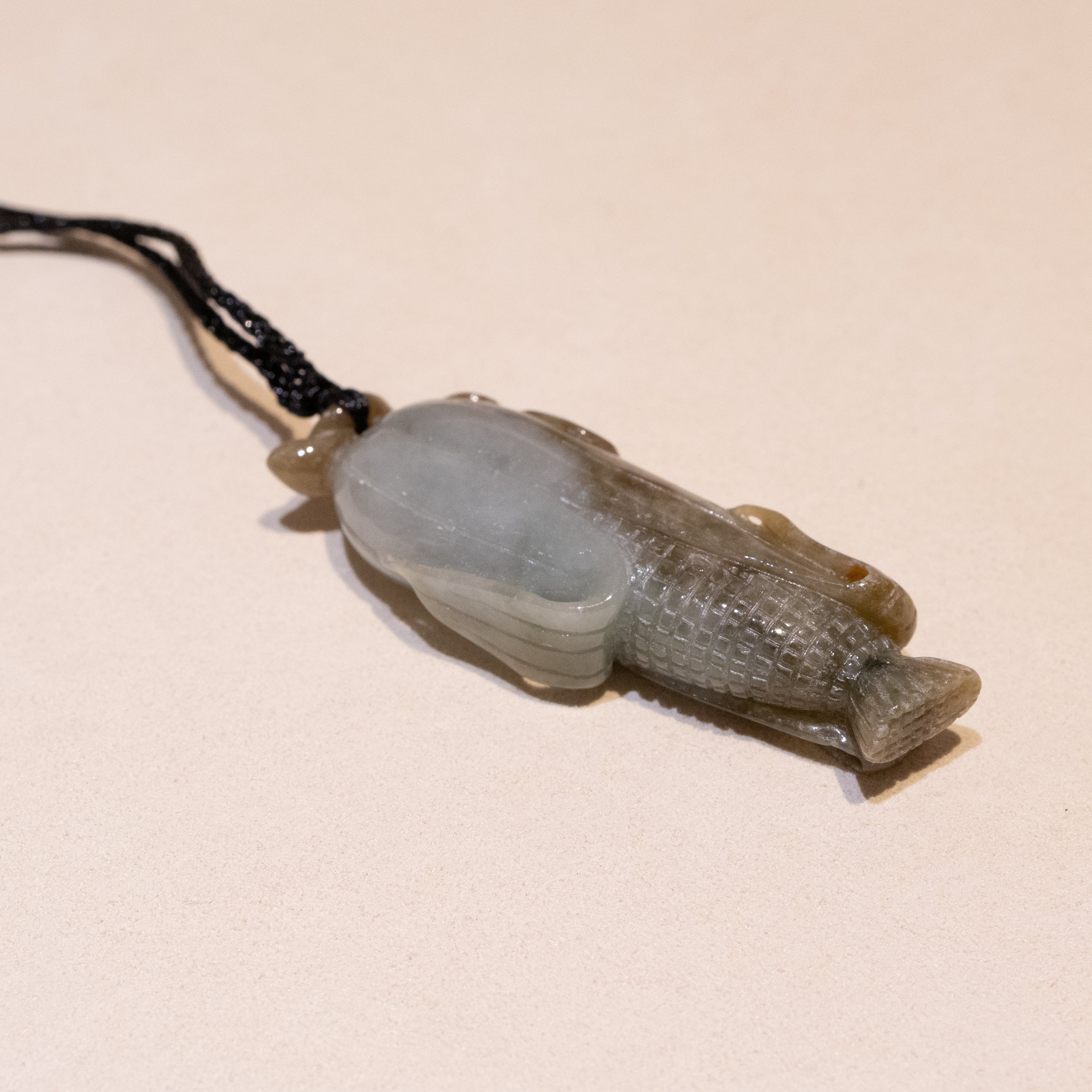 Brown Carved Sweetcorn Jade Pendant - Type A Burmese Jadeite
