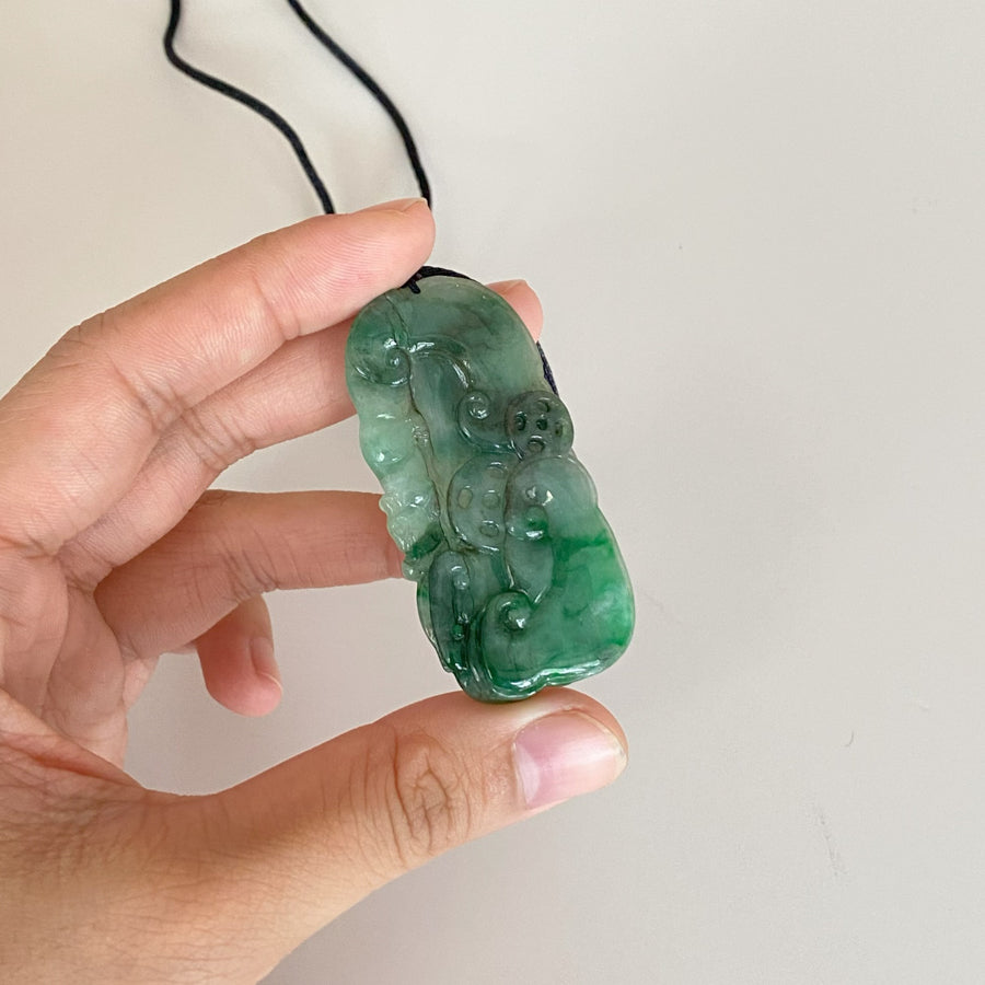 Carved Green Jade Ruyi Token Pendant